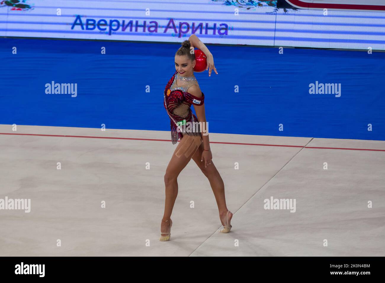 Moscow, Russia. 12th of September, 2022. Arina Averina performs her ball routine in a qualification at the 2022 All-Russian Summer Spartakiad in Rhythmic Gymnastics at Irina Viner-Usmanova Gymnastics Palace in Luzhniki in Moscow, Russia. Nikolay Vinokurov/Alamy Live News Stock Photo