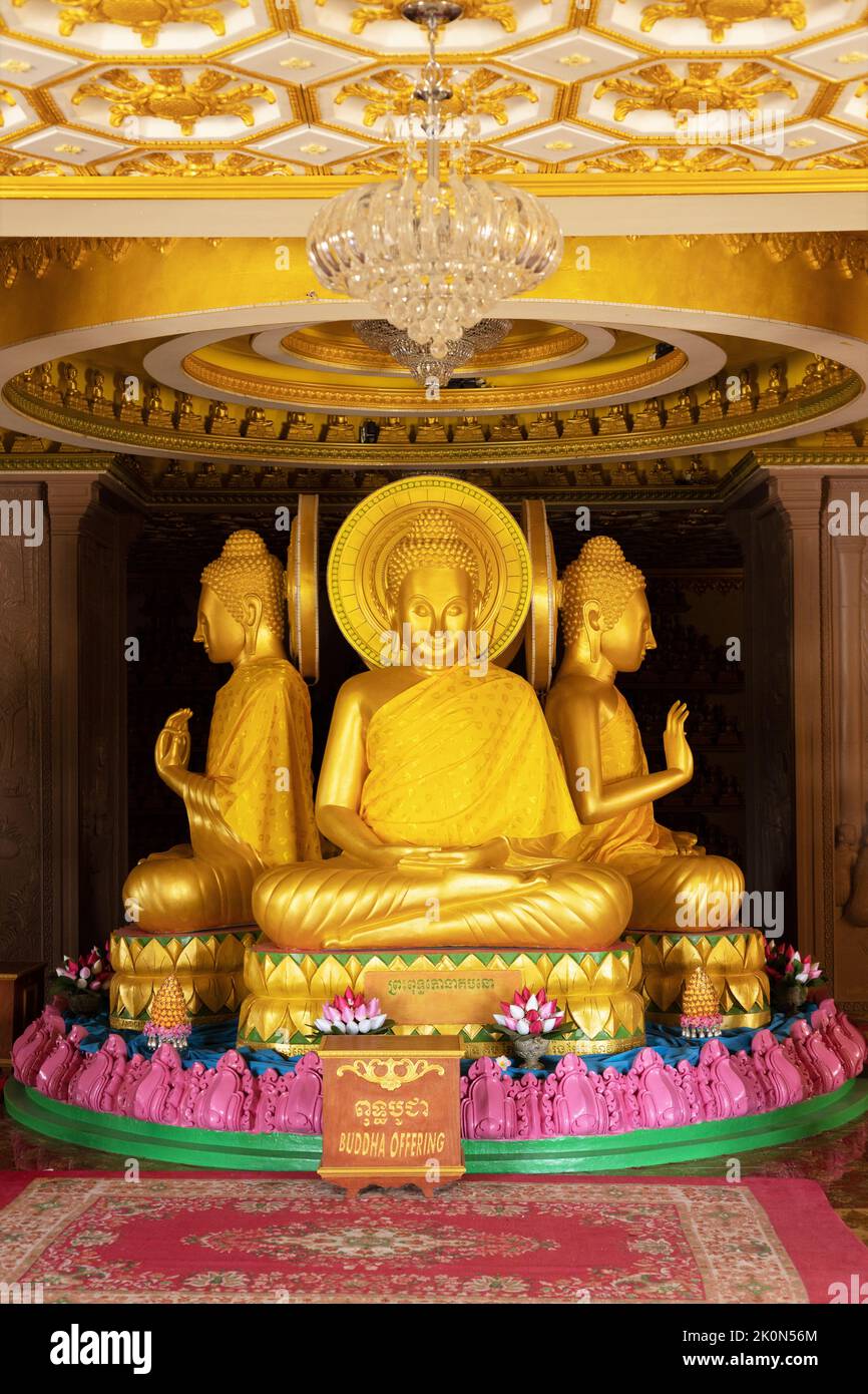 Gold Buddha statues at Watt Munisotaram Cambodian Buddhist Monastery in Hampton, Minnesota. Stock Photo
