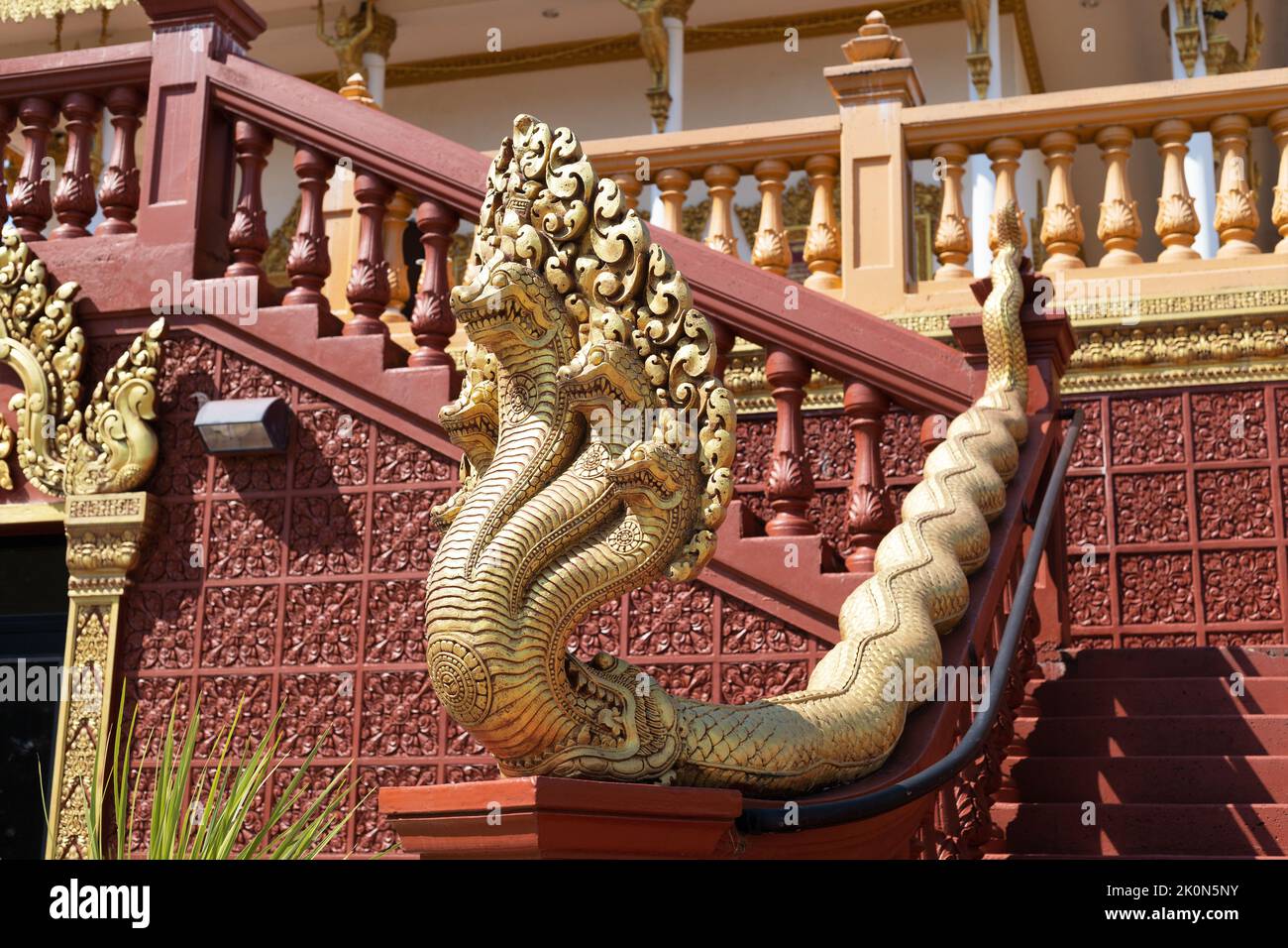 Gold serpents decorate a temple at Watt Munisotaram Cambodian Buddhist Monastery in Hampton, Minnesota. Stock Photo