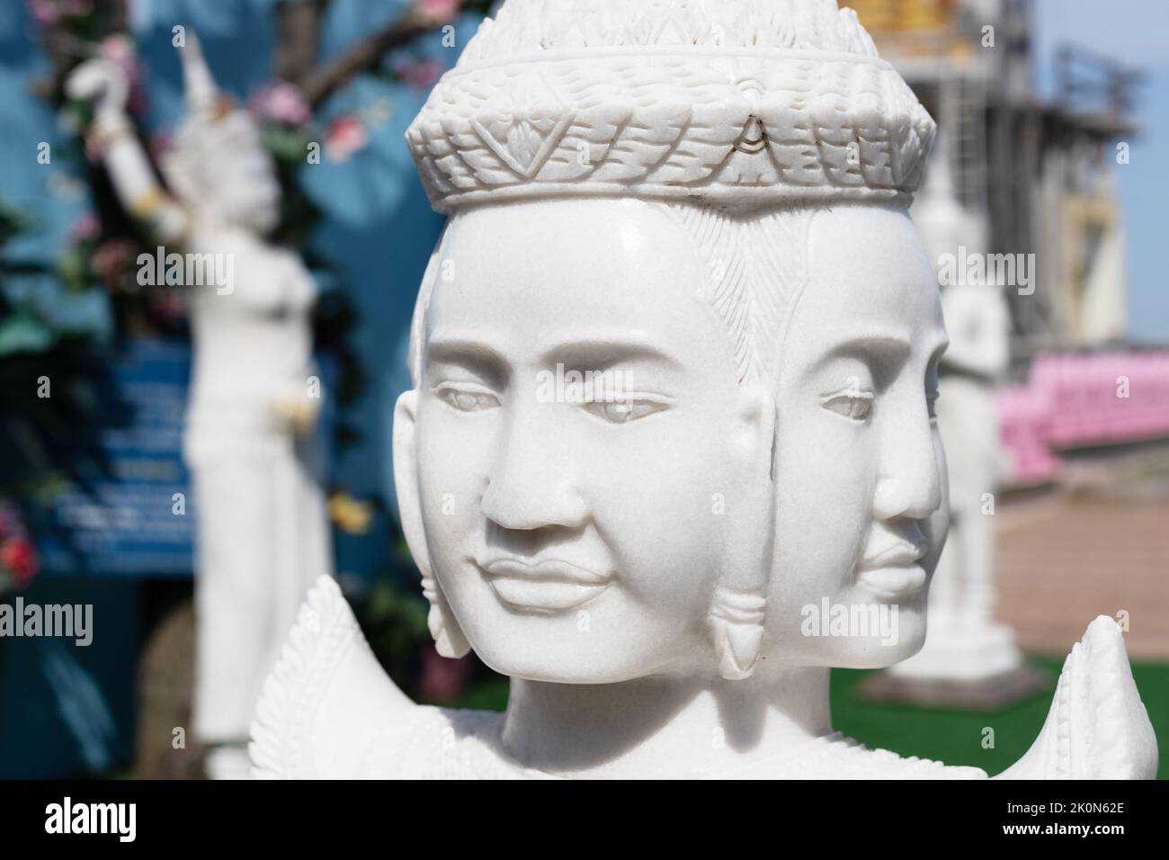 A statue with four faces at Watt Munisotaram Cambodian Buddhist Monastery in Hampton, Minnesota. Stock Photo
