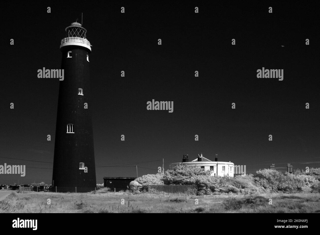 Infrared image of Dungeness lighthouse, Kent, England. Stock Photo