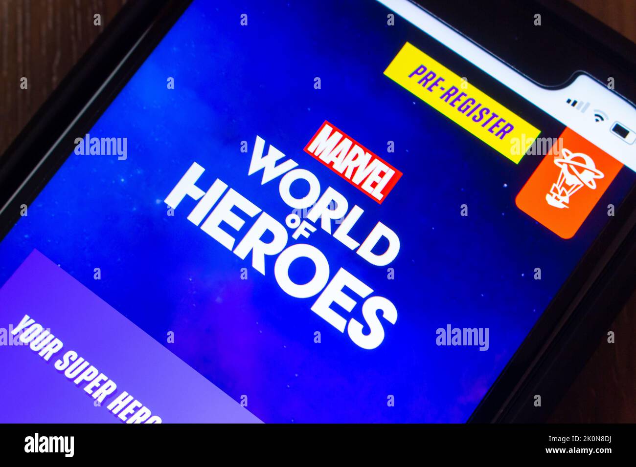Vancouver, CANADA - Sep 11 2022 : MARVEL World of Heroes website on iPhone. MARVEL & Niantic teamed up to launch AR Mobile Game MARVEL World of Heroes Stock Photo