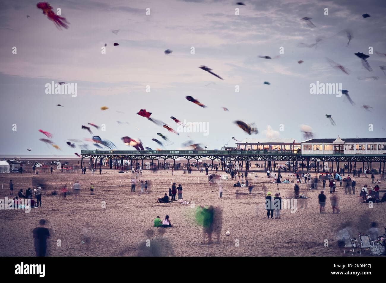 St Annes International kite festival held on the beach in September.Kites flying at dusk Stock Photo