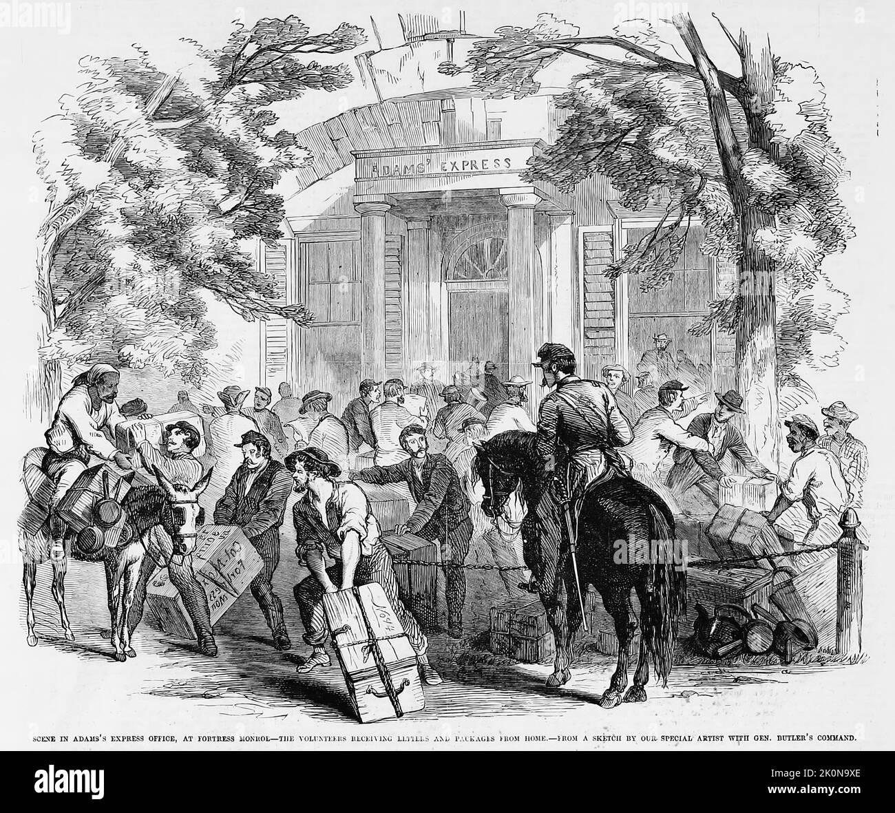 Scene in Adams' Express Office, at Fort Monroe, Virginia - The Volunteers receiving letters and packages from home. August 1861. 19th century American Civil War illustration from Frank Leslie's Illustrated Newspaper Stock Photo