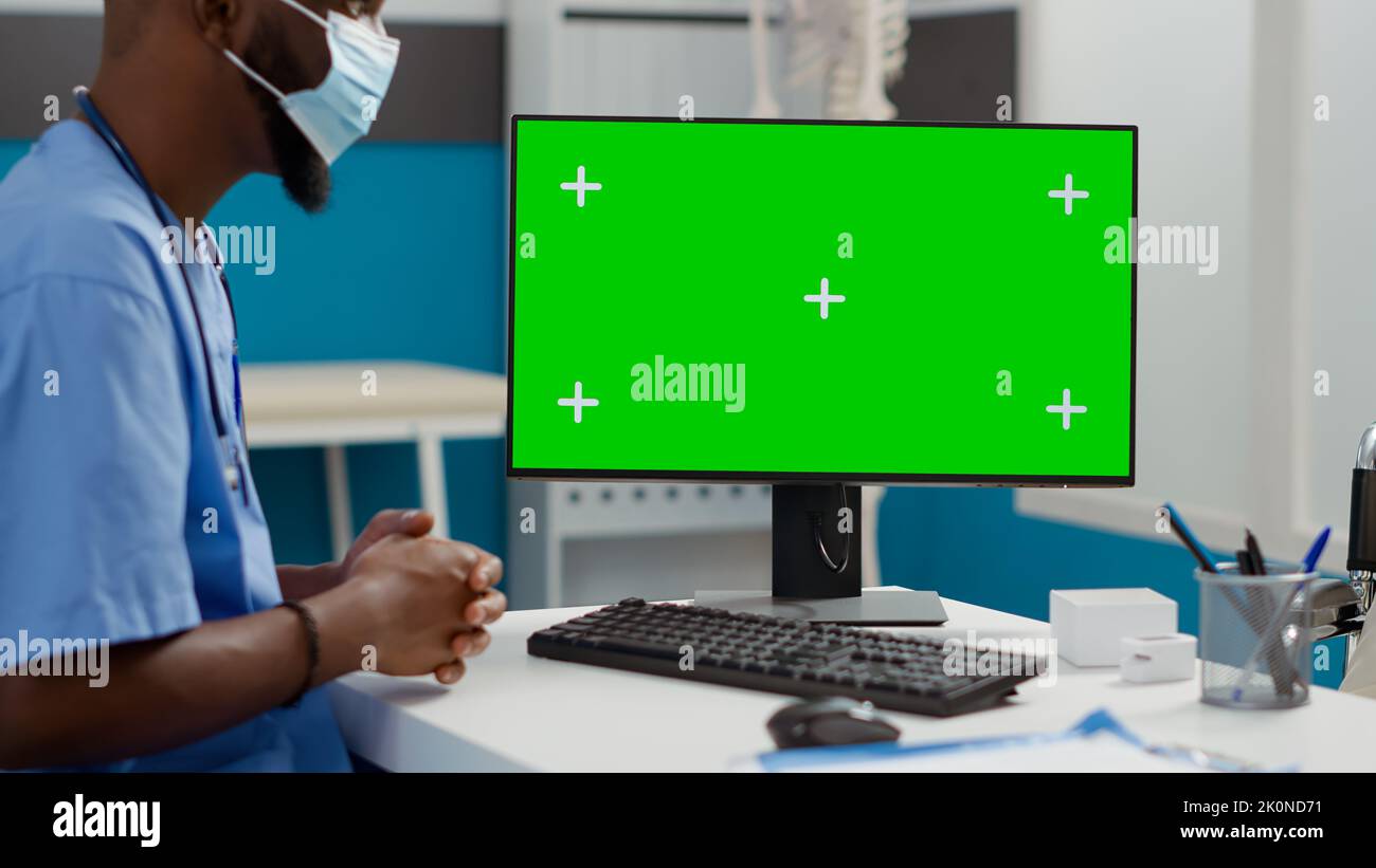 Medical specialist using greenscreen hi-res stock photography and ...