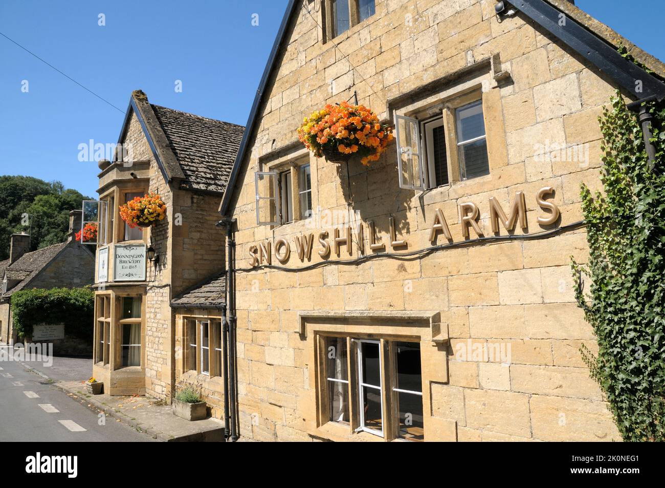 Close-up refurbished exterior of the Snowshill Arms, a traditional Cotswold stone pub in the picturesque village of Snowshill, Cotswolds, England, UK Stock Photo