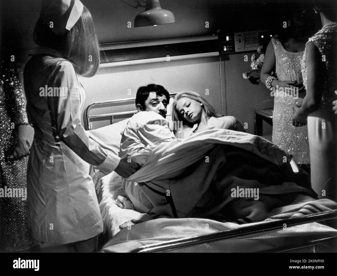 John Astin, Ewa Aulin, on-set of the Film, 'Candy', Cinerama Releasing Corporation, 1968 Stock Photo