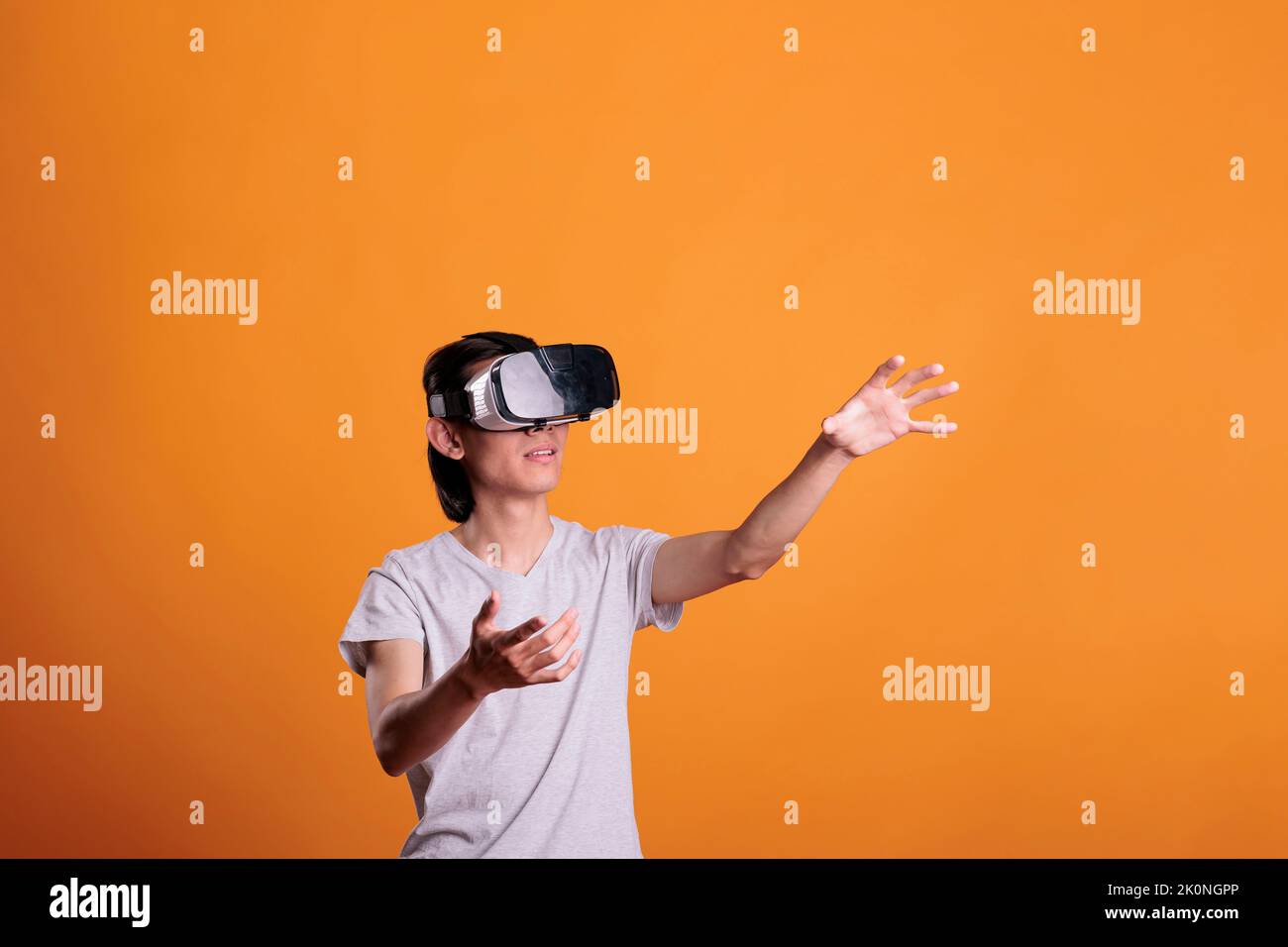 Man playing virtual reality games in vr goggles, exploring metaverse