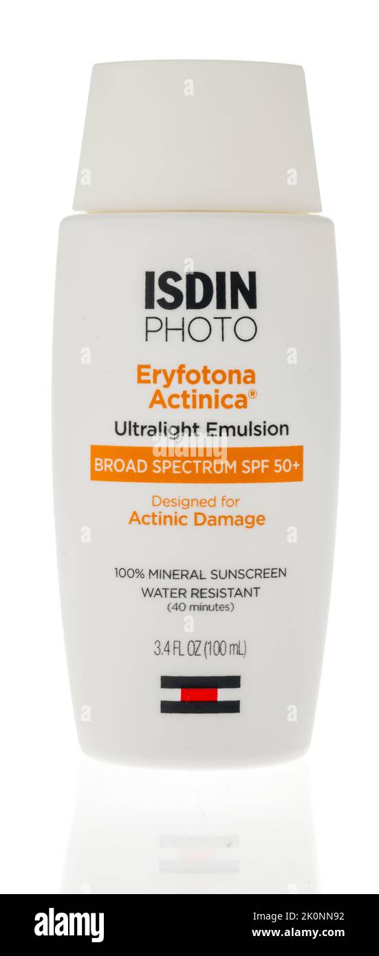 Winneconne, WI - 5 July 2022: A package of Isdin Photo ultralight emulsion mineral sunscreen on an isolated background. Stock Photo