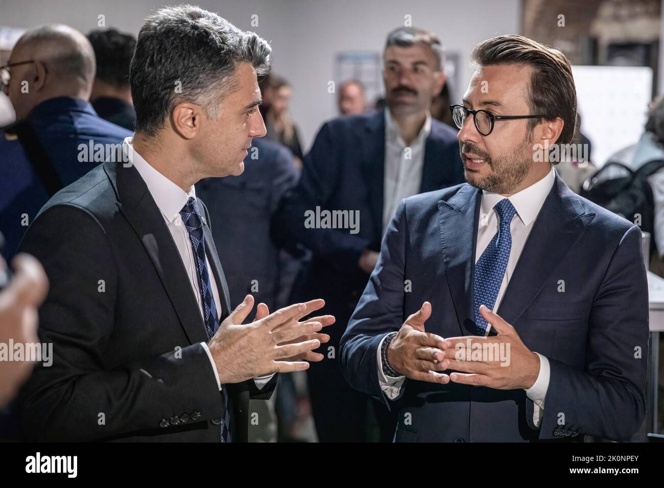 Istanbul, Turkey, 12/09/2022, Anadolu Agency General Manager Serdar Karagoz (right) and Anadolu Agency Visual News Editor Firat Yurdakul (left) seen evaluating photographs at the Istanbul Photo Awards 2022 exhibition. Istanbul Photo Awards 2022 Exhibition At Mimar Sinan Fine Arts University Tophane-i Amire Culture and Art Center, at the Single Dome building, with the participation of Anadolu Agency General Manager Serdar Karagoz, after the opening speech, Mimar Sinan Fine Arts University Rector Prof. Dr. Handan ?nci Elci opened with the presence of Beyoglu Mayor Haydar Ali Yildiz and guests. A Stock Photo