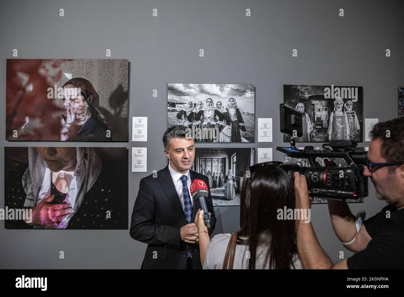 Istanbul, Turkey, 12/09/2022, Anadolu Agency Visual News Editor Firat Yurdakul made an evaluation about the exhibition. Istanbul Photo Awards 2022 Exhibition At Mimar Sinan Fine Arts University Tophane-i Amire Culture and Art Center, at the Single Dome building, with the participation of Anadolu Agency General Manager Serdar Karagoz, after the opening speech, Mimar Sinan Fine Arts University Rector Prof. Dr. Handan ?nci Elci opened with the presence of Beyoglu Mayor Haydar Ali Yildiz and guests. Award-winning photographs will be open to visitors until the end of September. Stock Photo