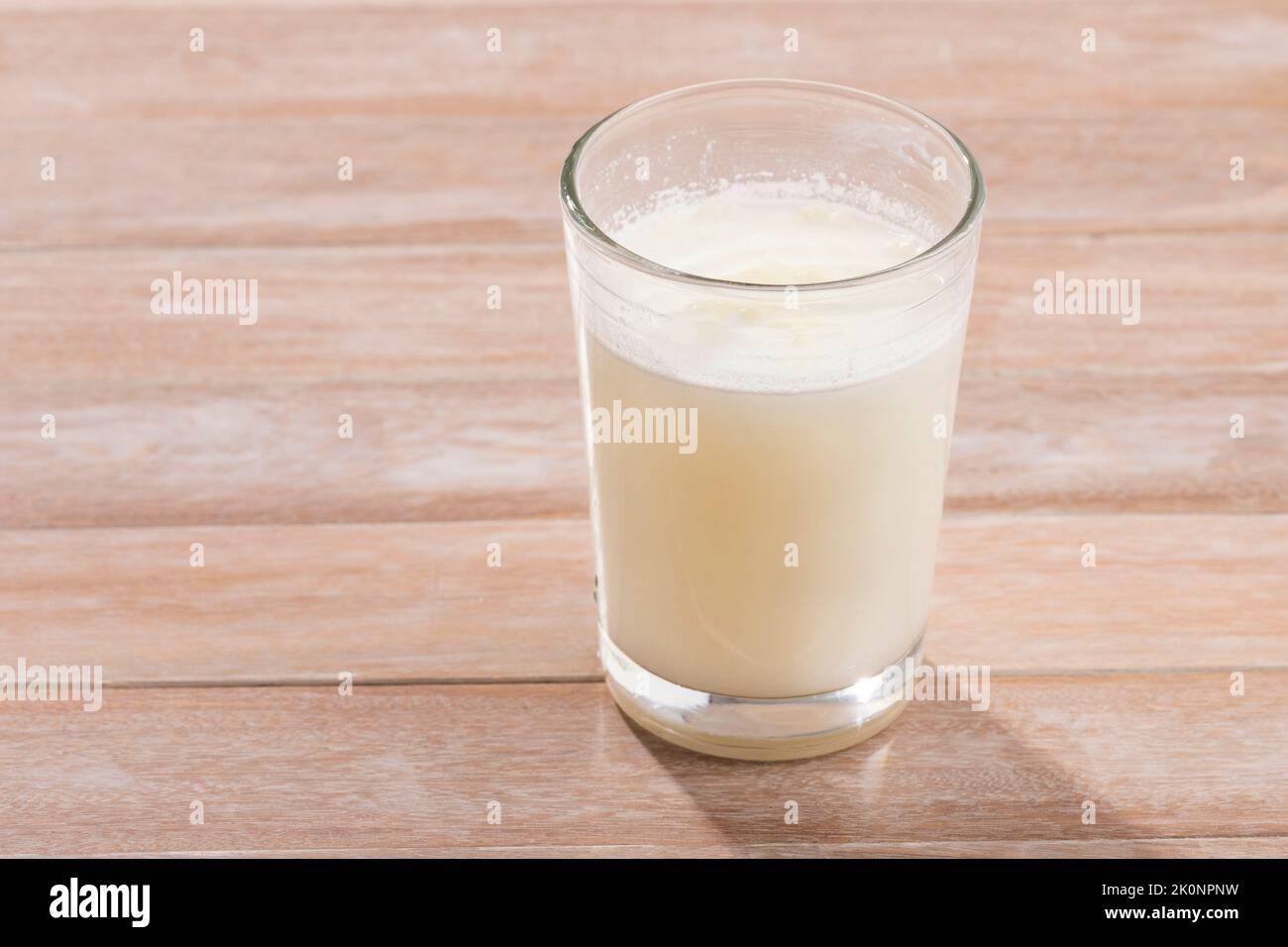 Glass of fresh liquid and powdered milk Stock Photo