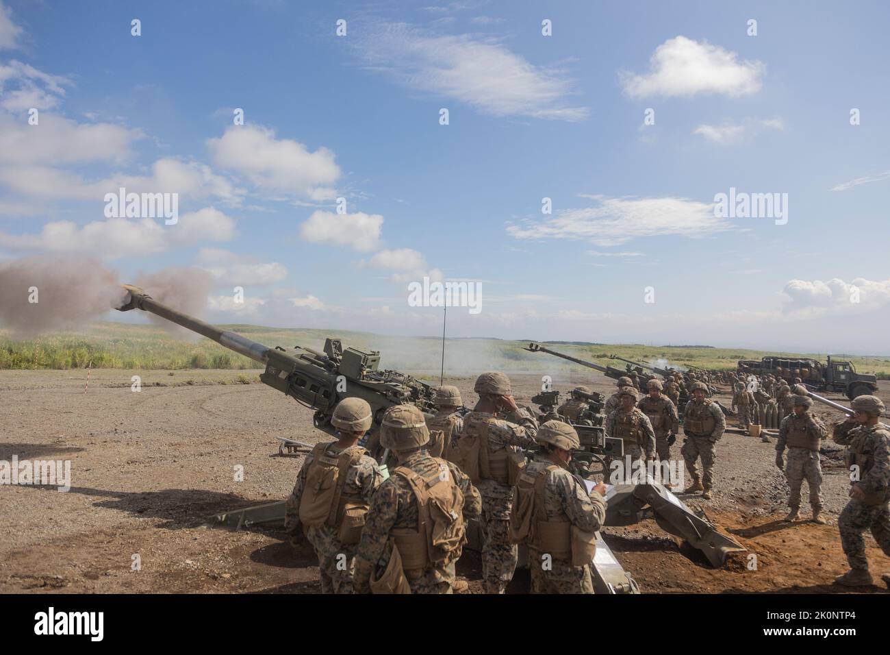 U.S. Marines with Charlie Company, 3d Battalion, 12th Marines, 3d Marine Division fire M777 howitzers during Artillery Relocation Training Program 22.2 at the Combined Arms Training Center, Camp Fuji, Japan, Sep. 4, 2022. ARTP is an exercise held to strengthen the defense of Japan and the U.S.-Japan Alliance as the cornerstone of peace and security in the Indo-Pacific region.  (U.S. Marine Corps photo by Lance Cpl. Jaylen Davis) Stock Photo