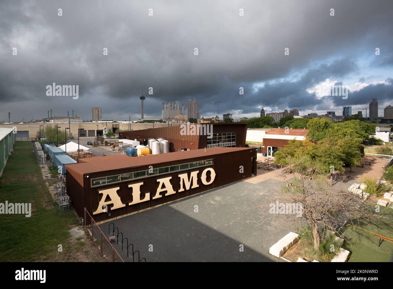 A storm rolls into San Antonio, Texas, as seen from the Hays Street Bridge with Alamo Beer Company in the foreground. Stock Photo