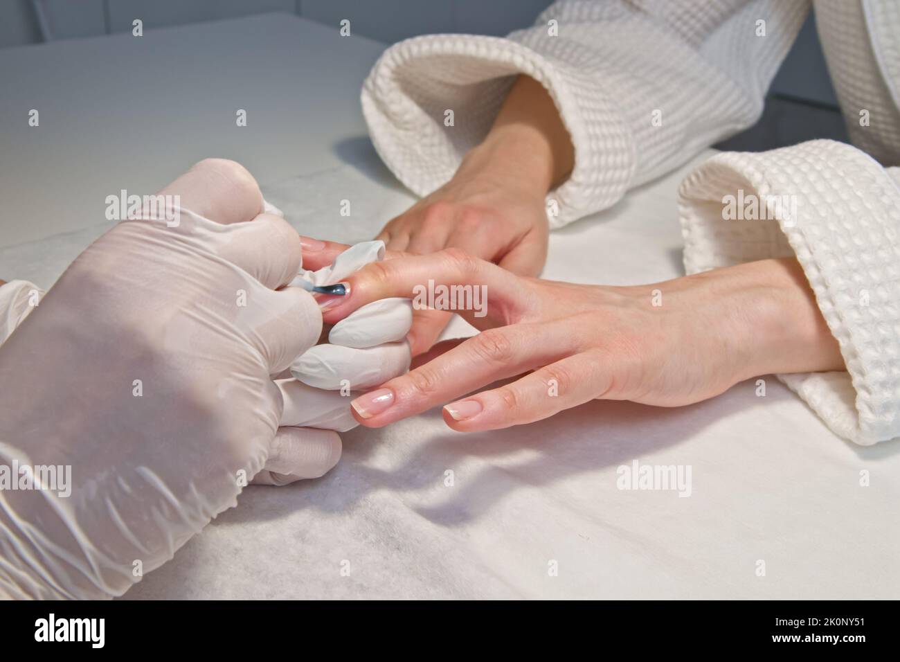 Manicure process professional tools female hand Stock Photo