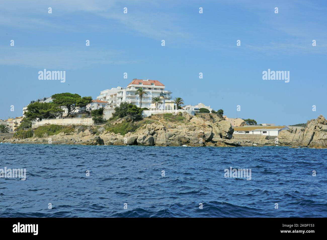 Panoramic view of the Palamós lighthouse located on the Costa Brava province of Gerona, Catalonia, Spain Stock Photo