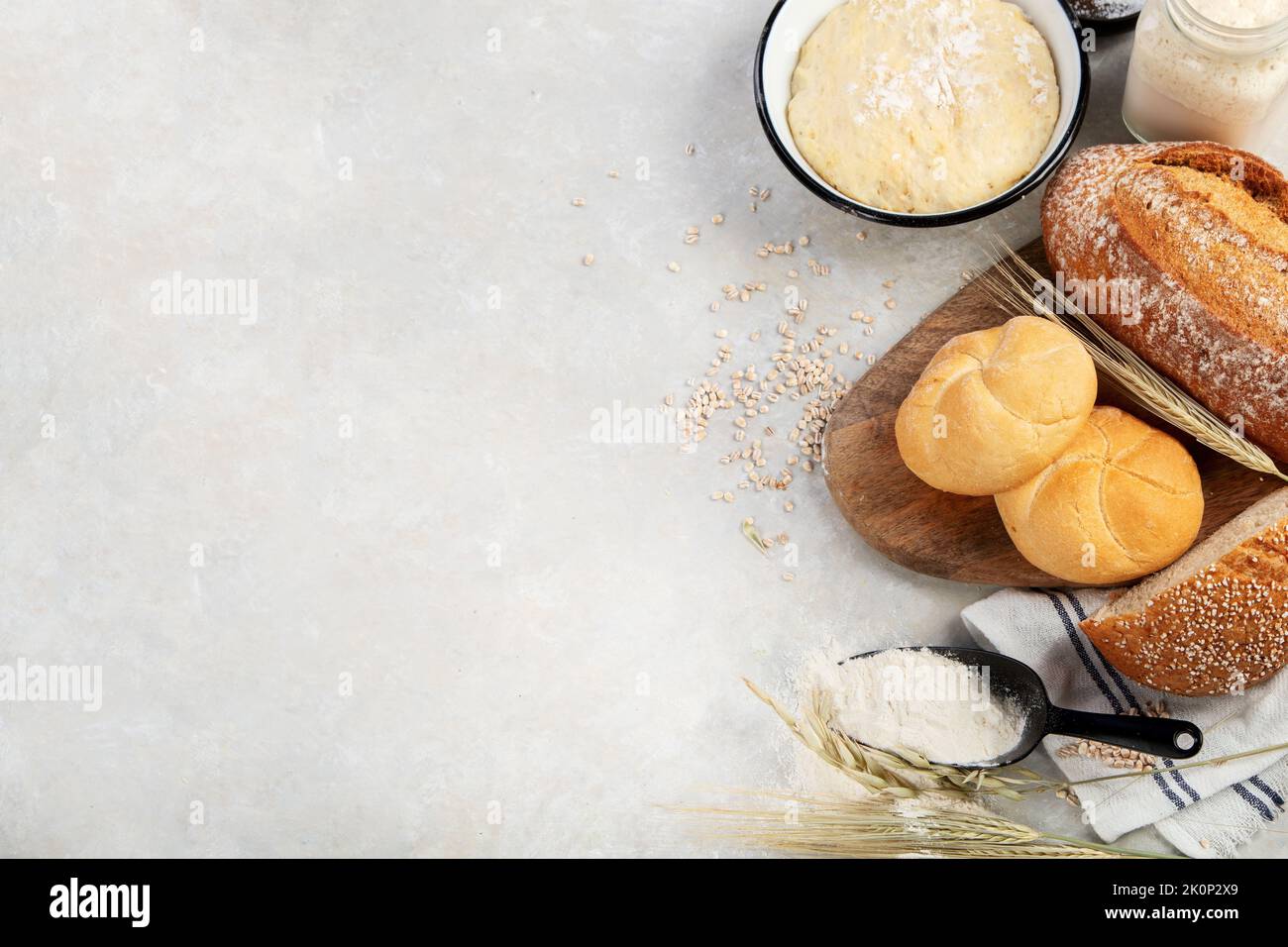Bread assortment on neutral background. Fresh homemade pastry. Top view, copy space Stock Photo