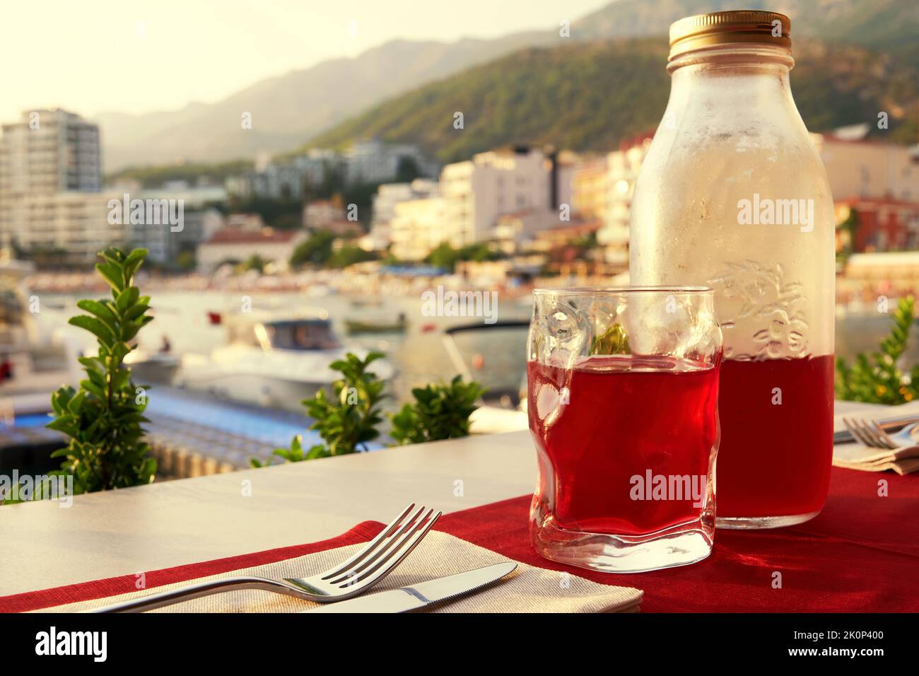 Elegant seaside restaurant table in the harbor. Eat and drink on