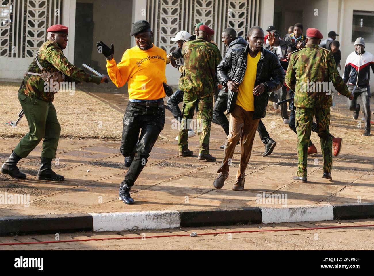 Riot police attempt to control people as they jostle to attend the inauguration of Kenya's President William Ruto before his swearing-in ceremony at the Moi International Stadium Kasarani, in Nairobi, Kenya September 13, 2022. REUTERS/Thomas Mukoya Stock Photo