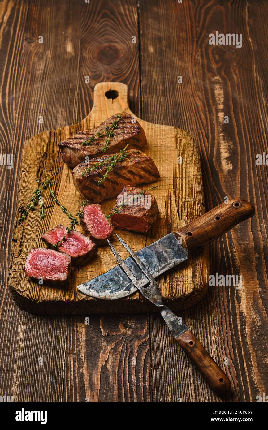 Grilled beef steak, prime strip loin meat Stock Photo Alamy