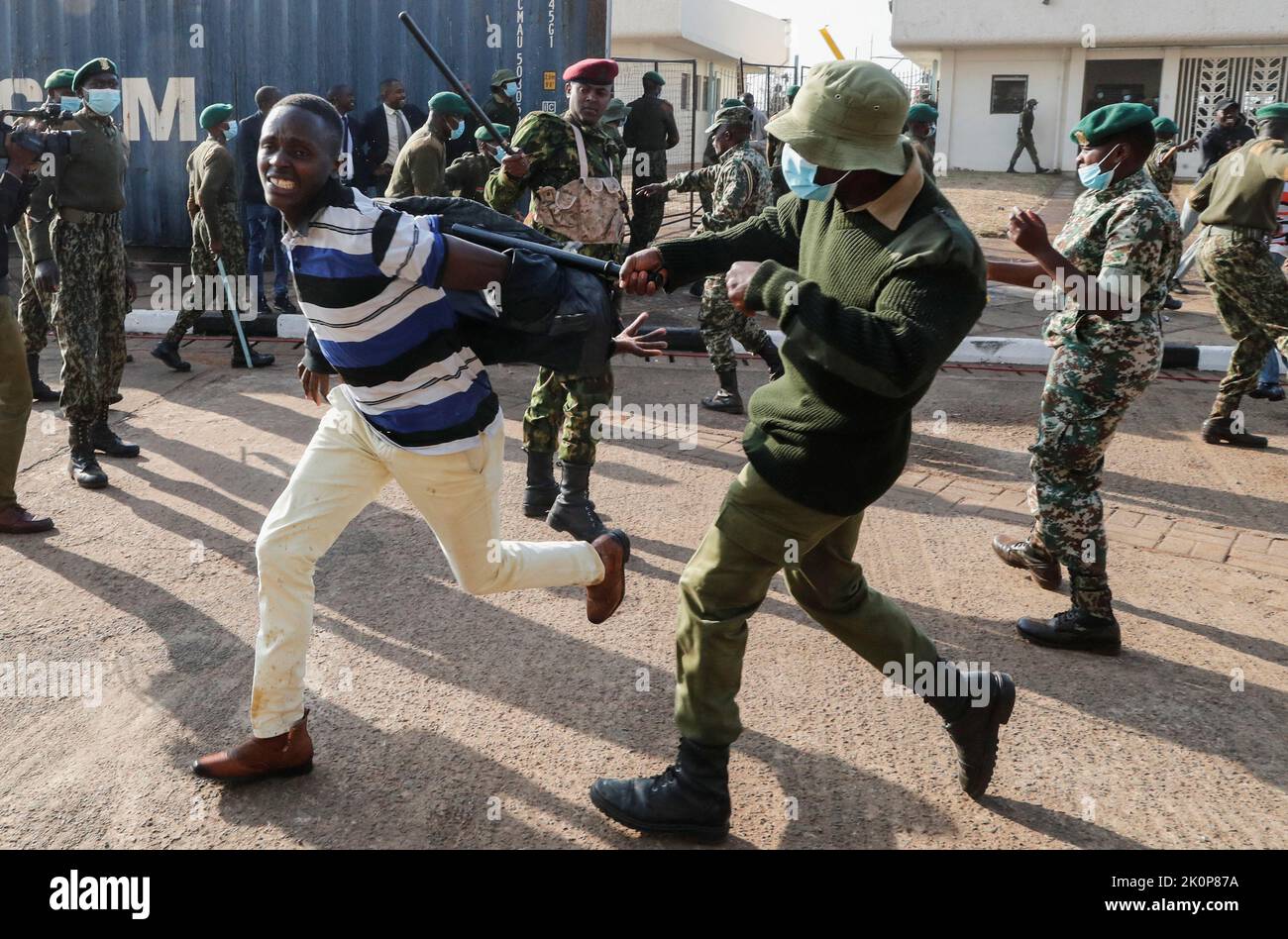 Riot police attempt to control people as they jostle to attend the inauguration of Kenya's President William Ruto before his swearing-in ceremony at the Moi International Stadium Kasarani, in Nairobi, Kenya September 13, 2022. REUTERS/Thomas Mukoya Stock Photo