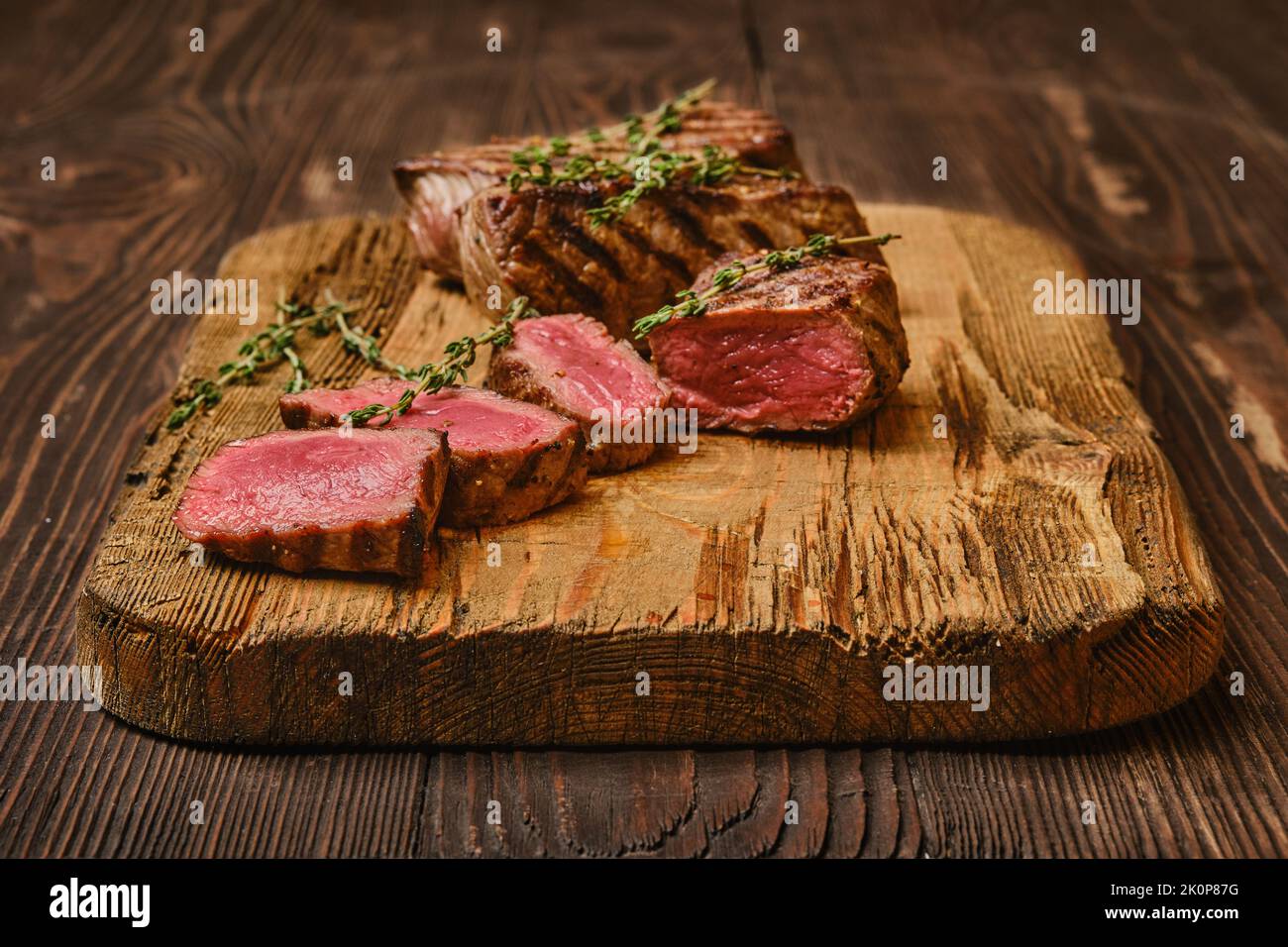 Grilled beef tri tip loin steak, medium rare roast Stock Photo Alamy