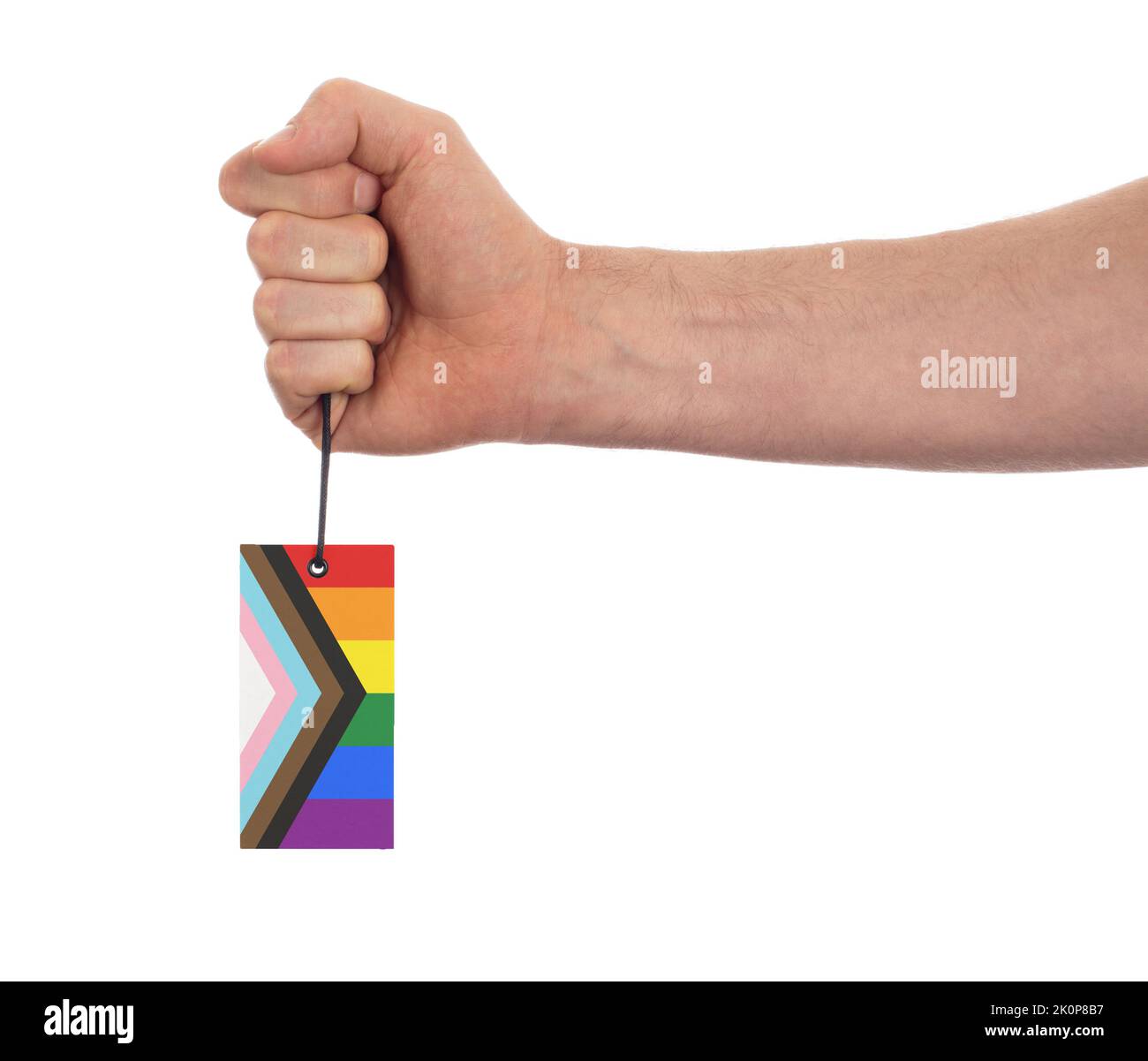 Adult hand isolated with a label - The Progress LGBTQ Rainbow flag Stock Photo