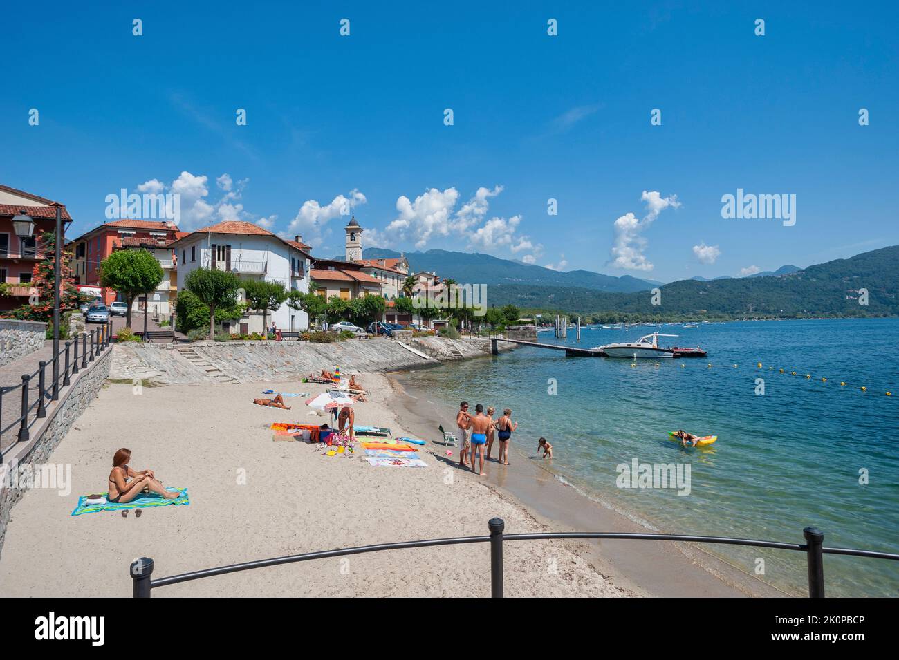 Townscape and beach, Feriolo, Piedmont, Italy, Europe | View of Feriolo on Lake Maggiore. Feriolo is a town in Piedmont in Northern Italy Stock Photo