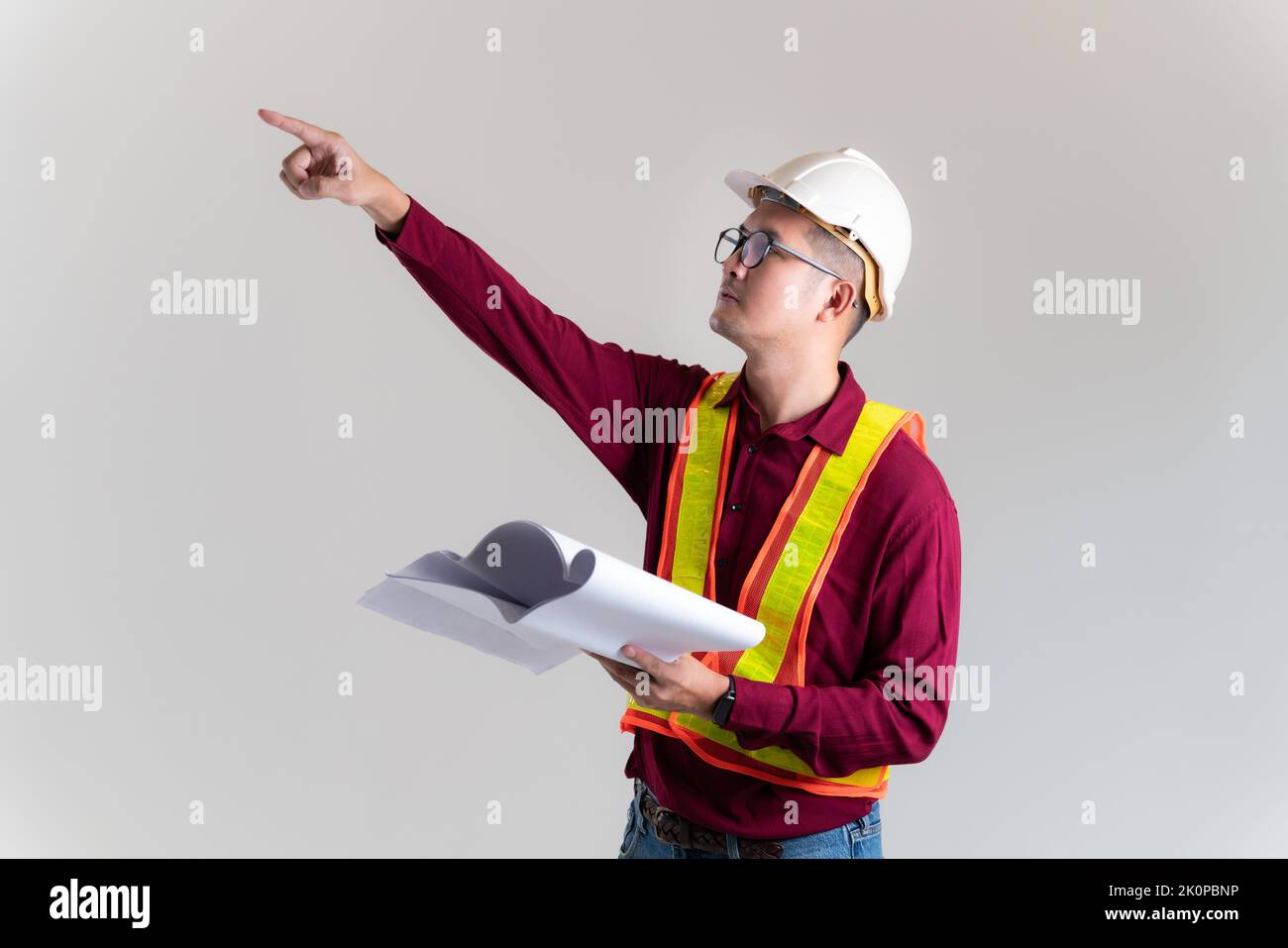 Architect civil engineer working with blueprints in a studio. Architect