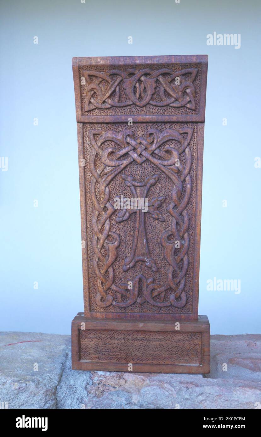 Ornamental, handcrafted, wooden Armenian khachkar Stock Photo