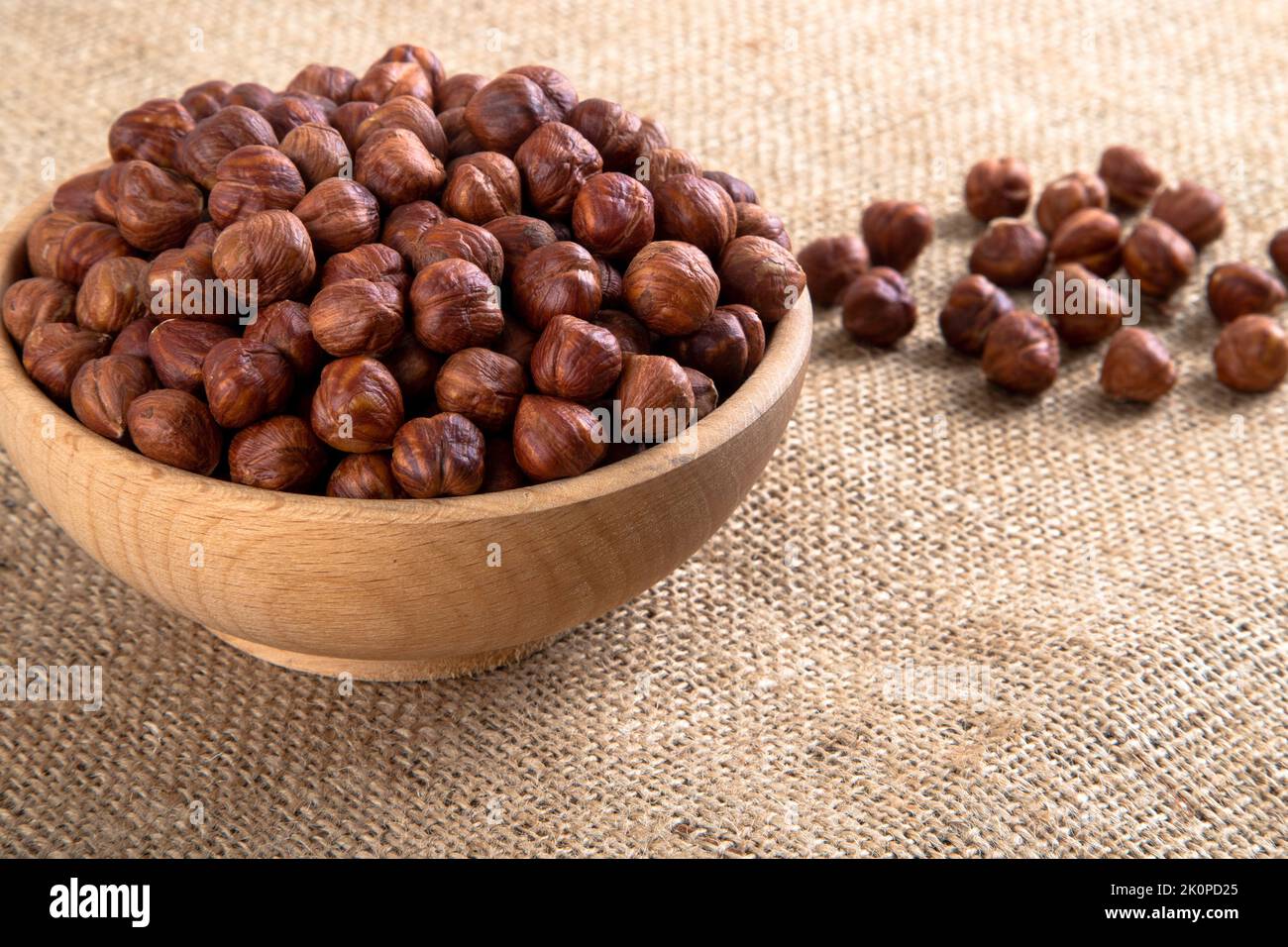 Top view of a bowl full of hazelnuts Stock Photo