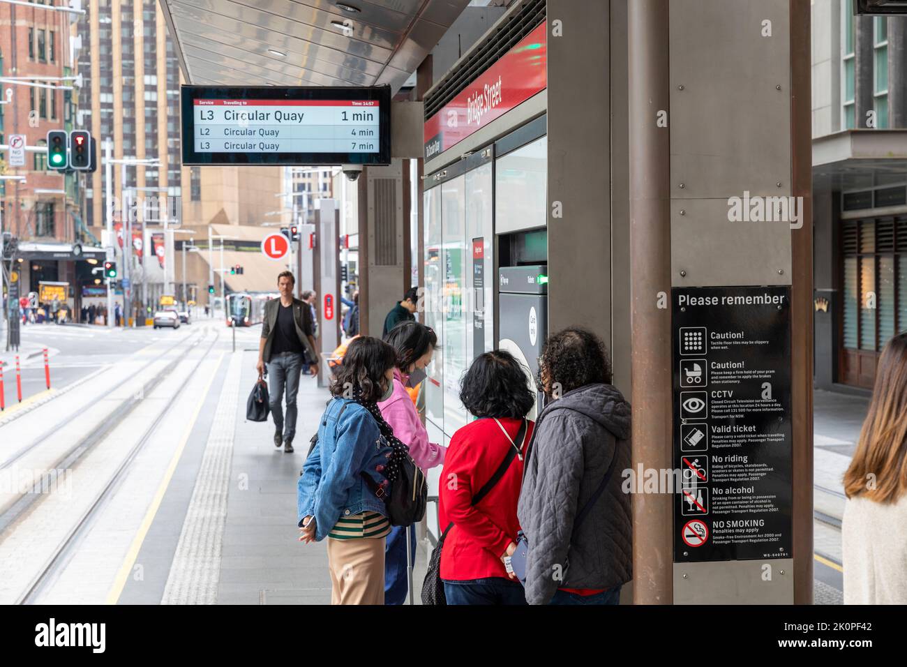 Sydney CBD light rail network, commuters wait on Bridge street station for a light rail train,Sydney city centre,NSW,Australia Stock Photo