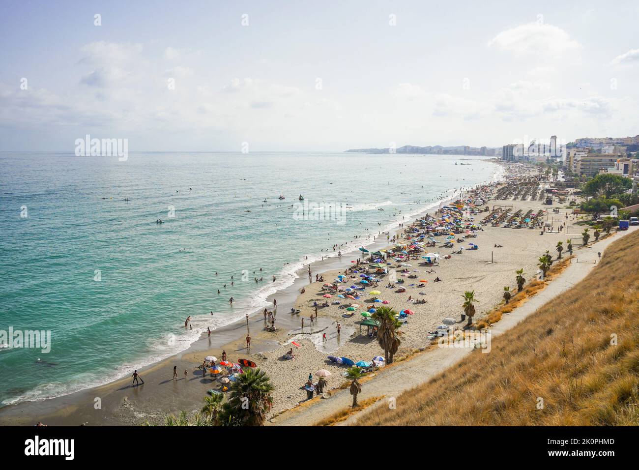 Crowded beach  with parasols busy beach, Fuengirola, Los Boliches, Andalusia, Costa del Sol, Spain. Stock Photo