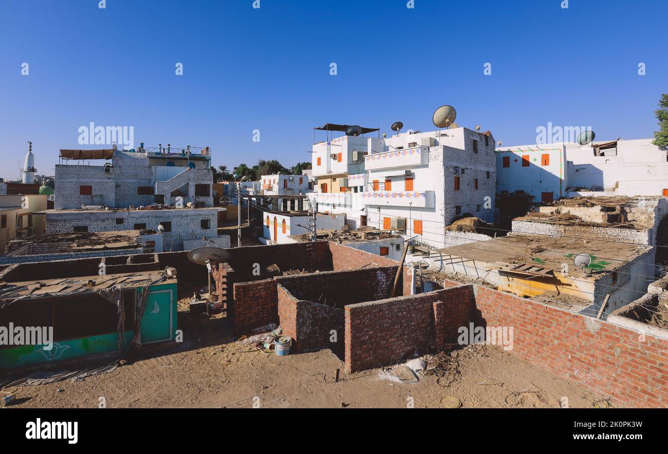 Colorful Buildings in Aswan with Local Nubian Style Decoration on the Walls, Egypt Stock Photo
