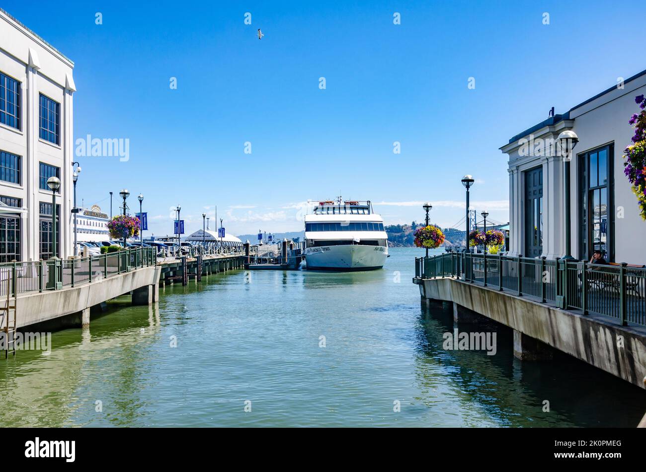 A yacht named 'San Francisco Spirit' moored in San Francisco under a blue sky on a summer's day Stock Photo