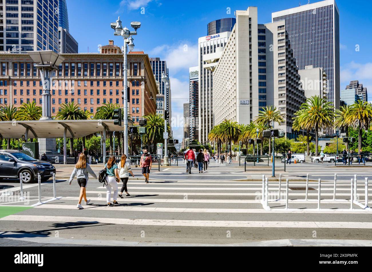 Pedestrian crossing busy with people crossing Embarcadero in San Francisco, California Stock Photo