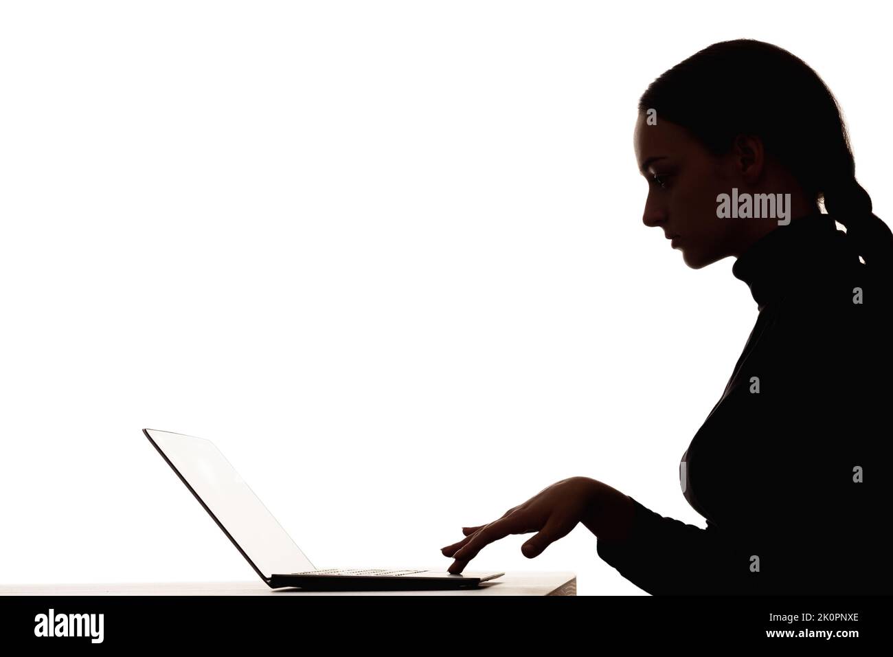 woman silhouette online learning student laptop Stock Photo