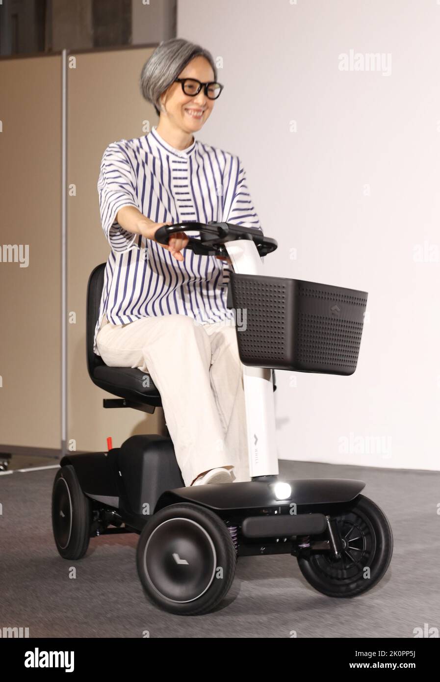Tokyo, Japan. 13th Sep, 2022. A model demonstrates to drive Japan's