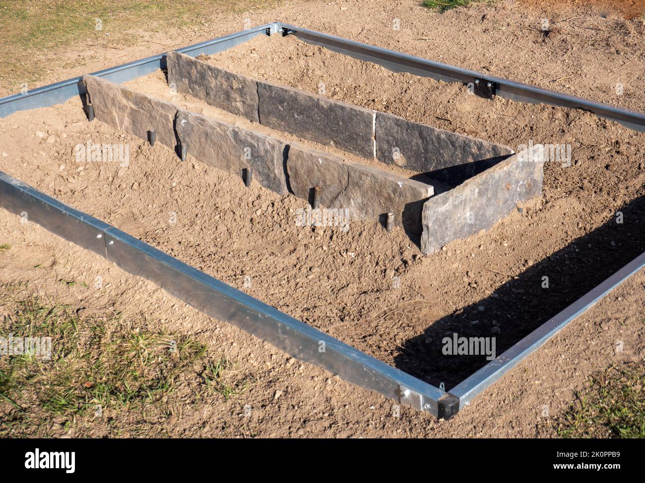 Foundation of a greenhouse in the garden Stock Photo