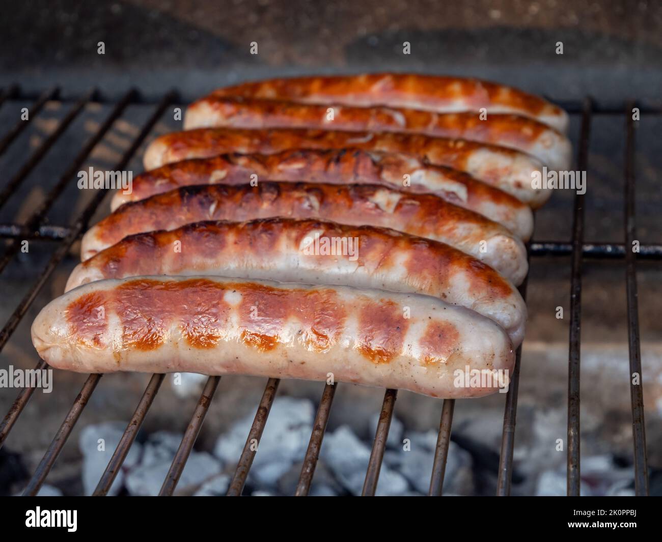 Bratwurst on a charcoal grill Stock Photo