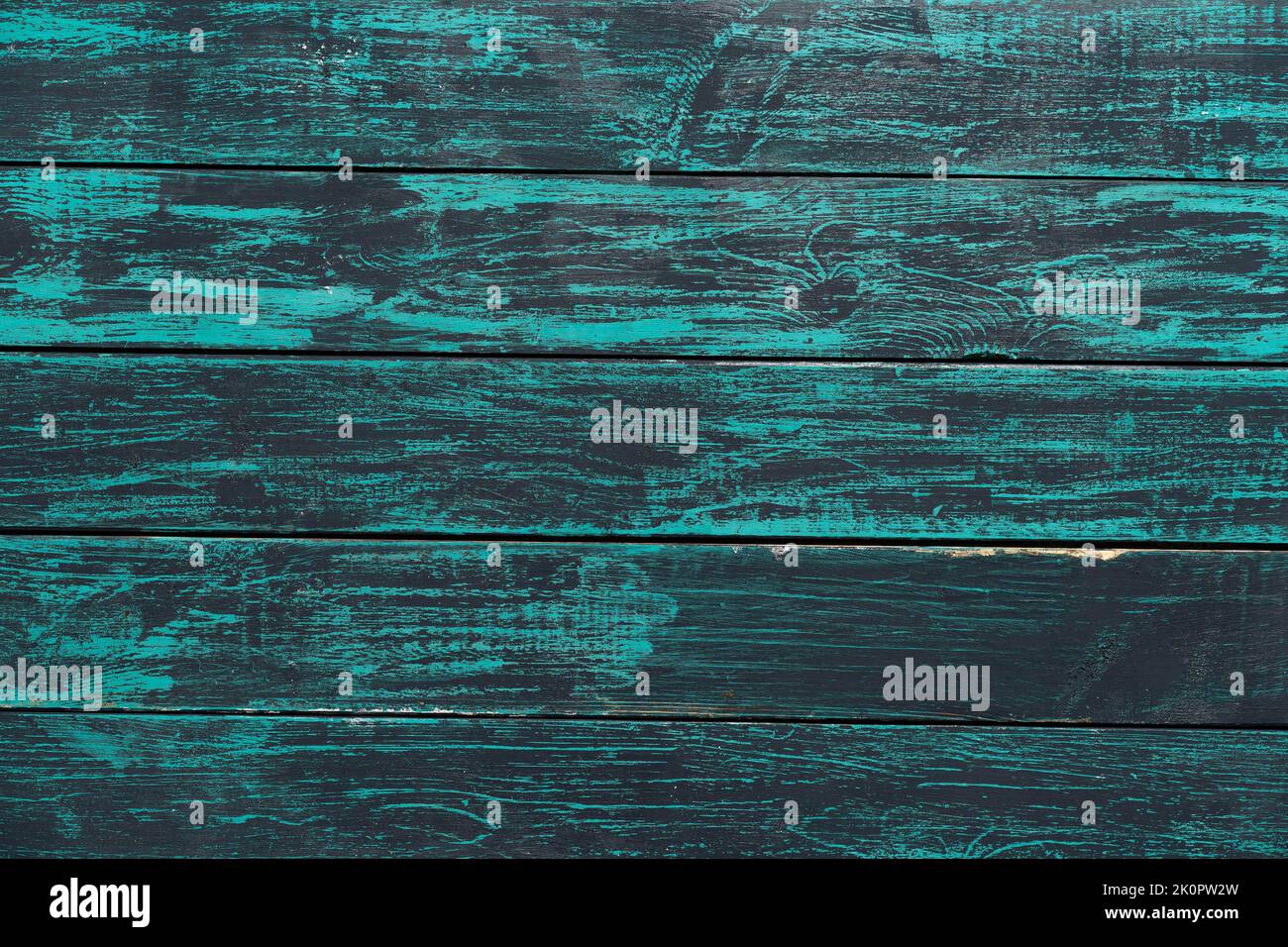 Natural scuffed patterns on the wall. Old Grand wooden textured background. Blue boards old design. Turquoise color. Painted timber. Horizontal board. Vintage wood texture blue panel. Stock Photo