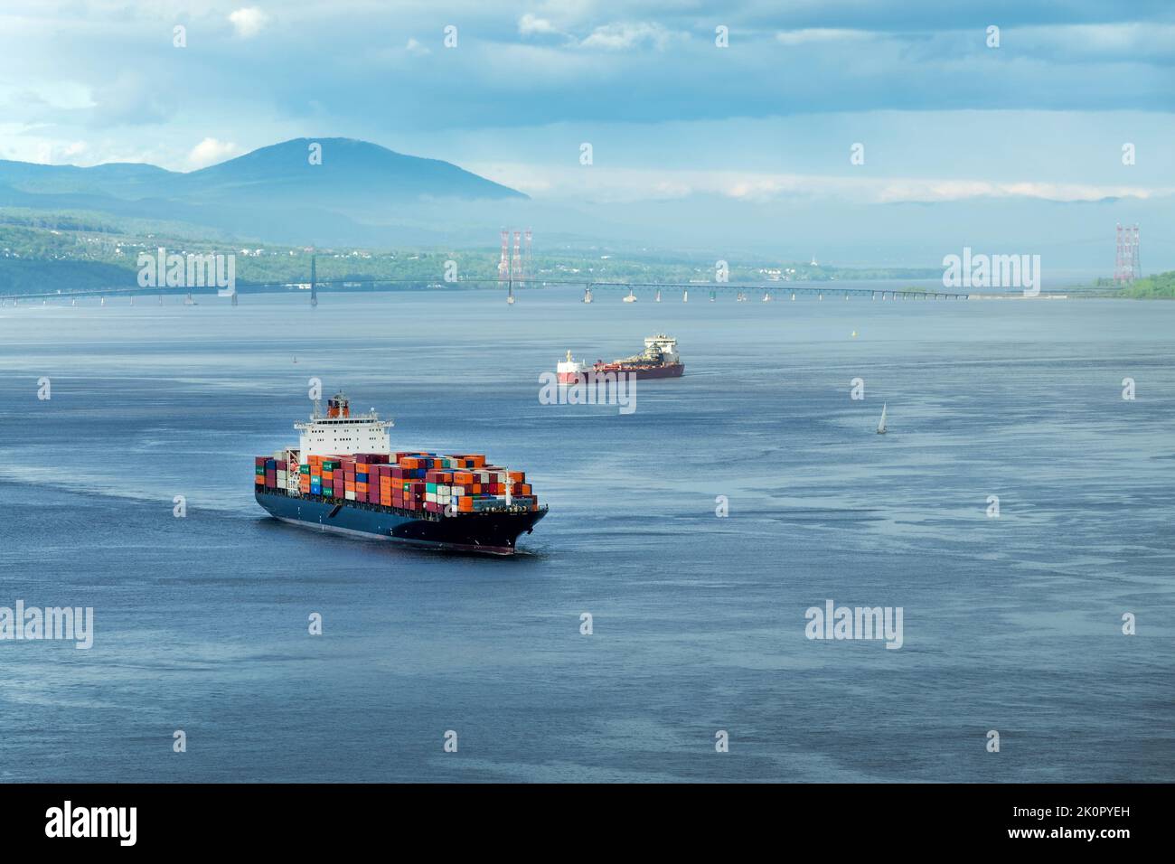 Container ships on St Lawrence river in Quebec, Canada Stock Photo