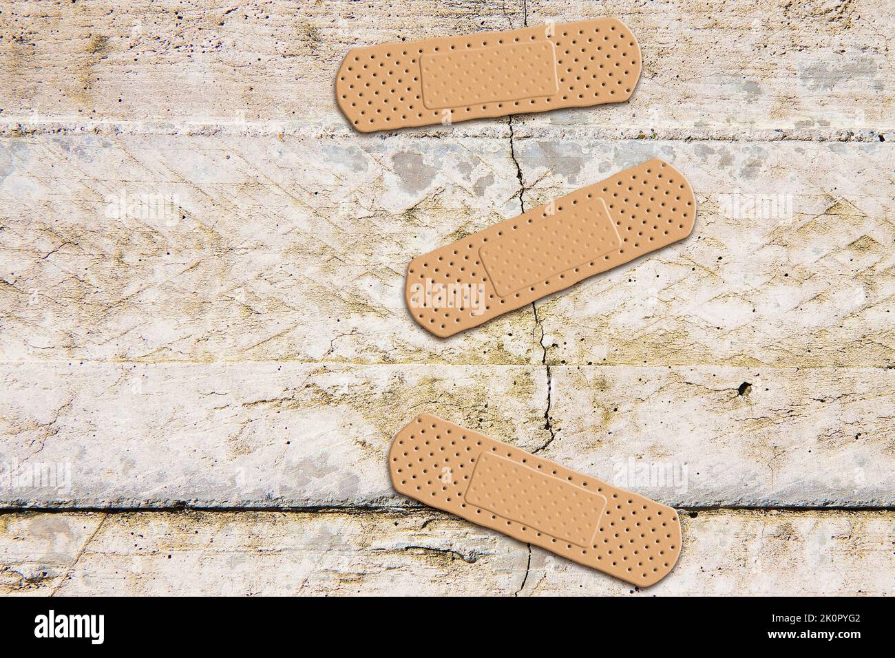 Renovation of an old cracked concrete wall concept image with adhesive