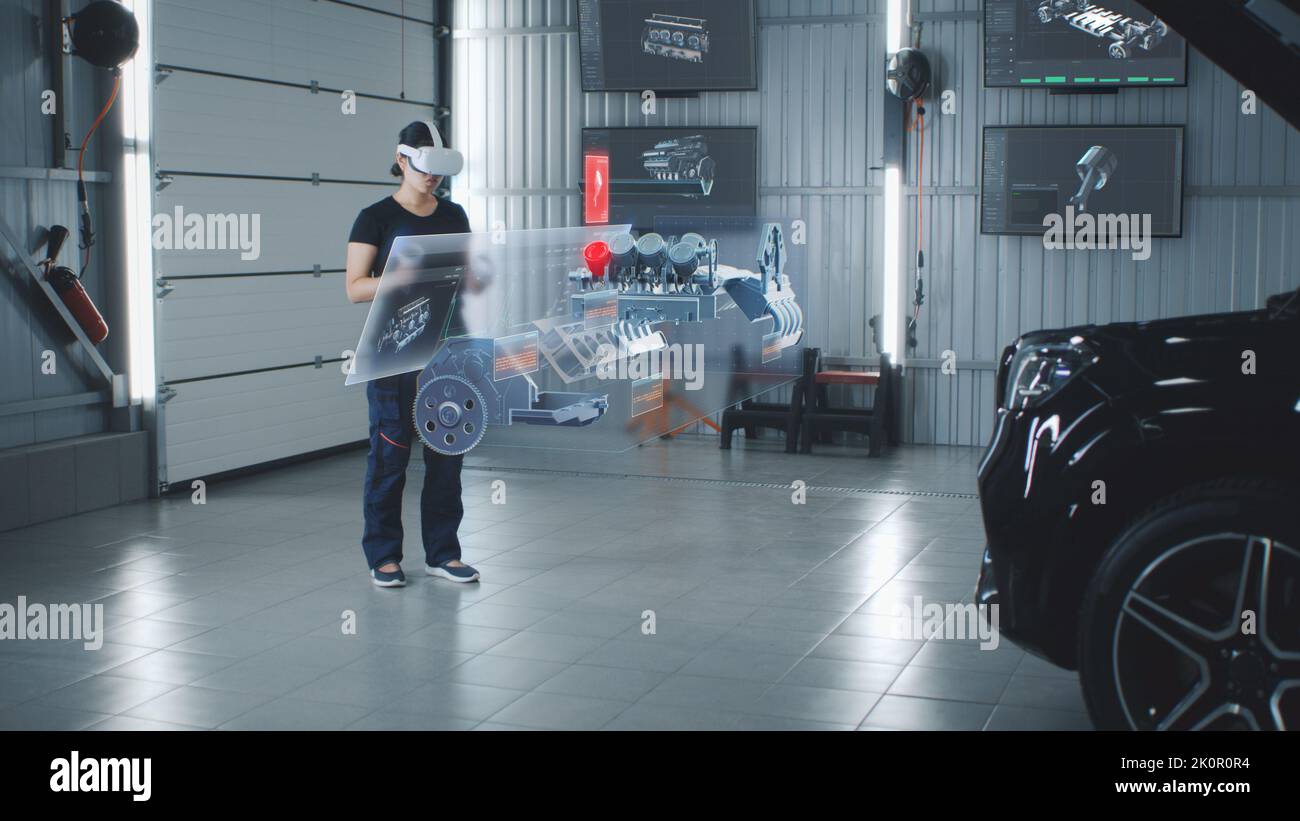 An automotive maintenance engineer conducts a review of an internal