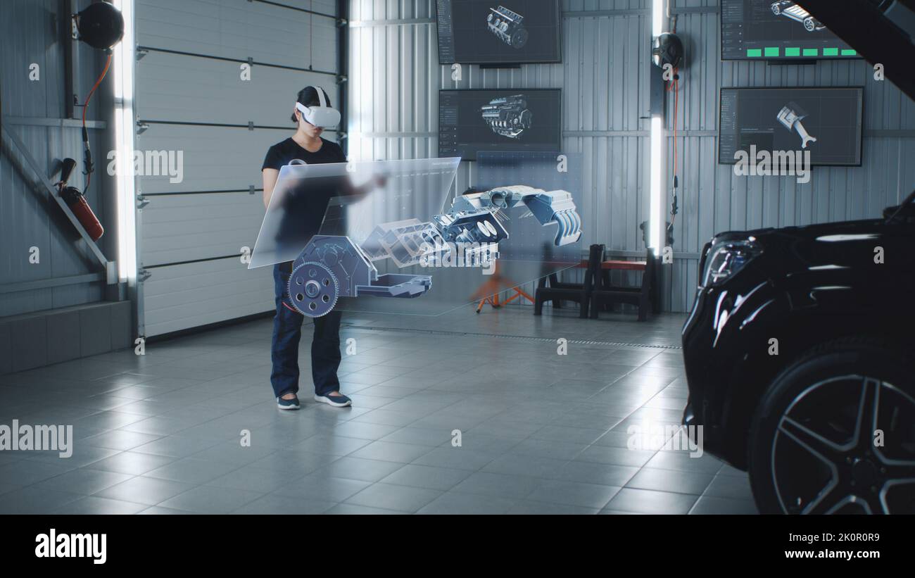 An automotive maintenance engineer conducts a review of an internal