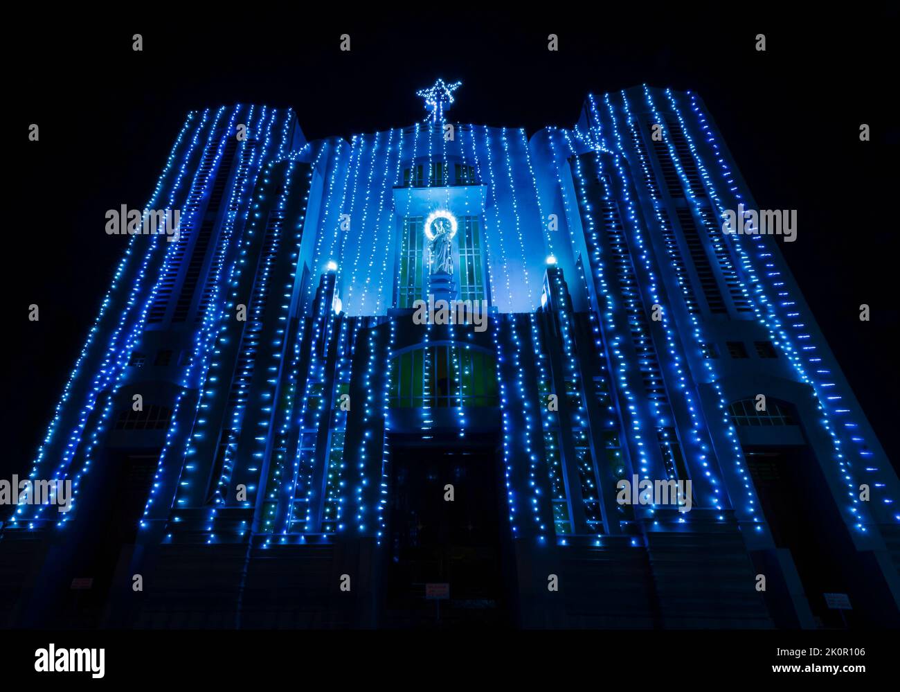 The Cathedral of Mary Help of Christians in Shillong, Meghalaya, India, decorated with fluorescent lights for the Christmas season. Stock Photo