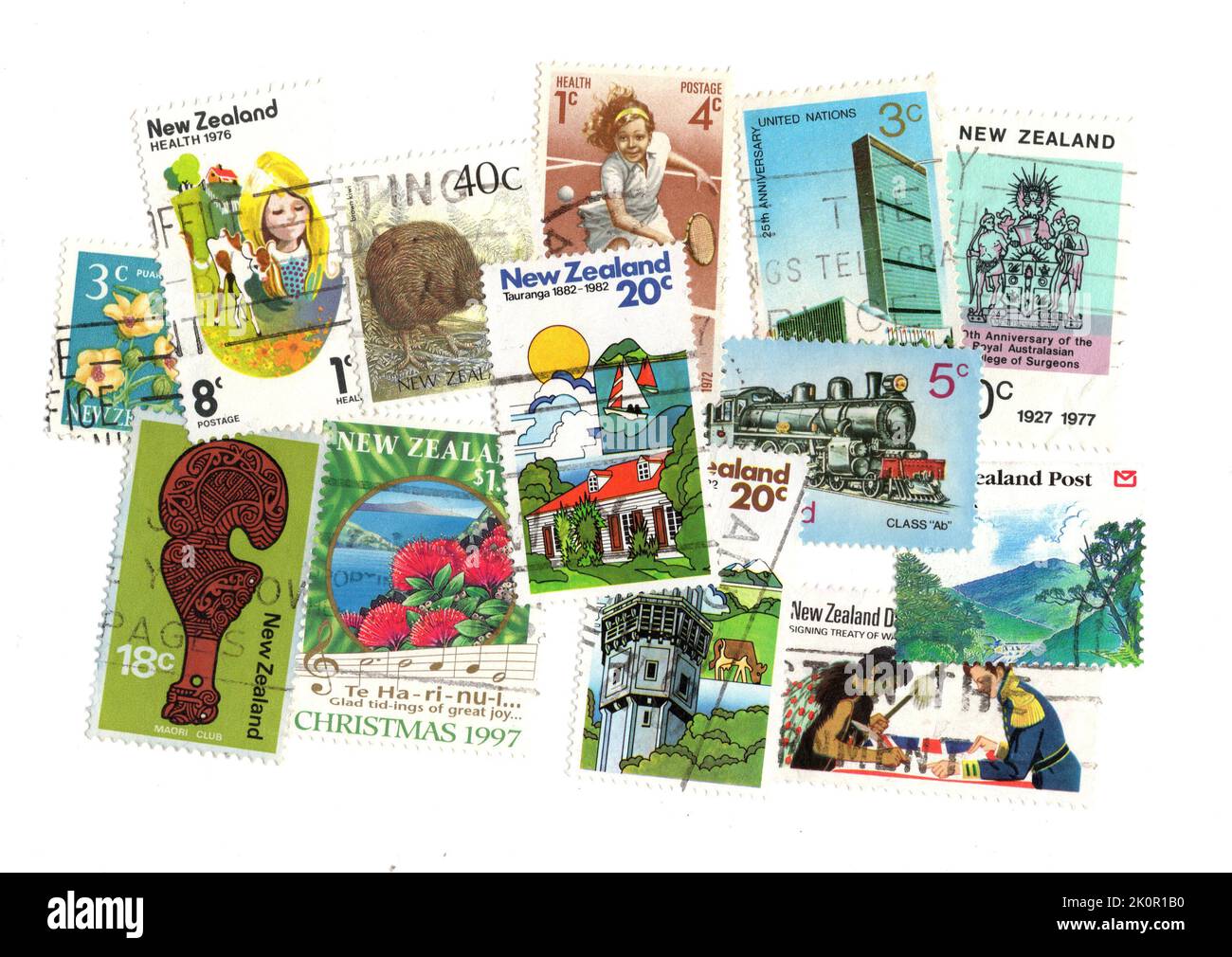 A montage of postage stamps from New Zealand on a white background. Stock Photo