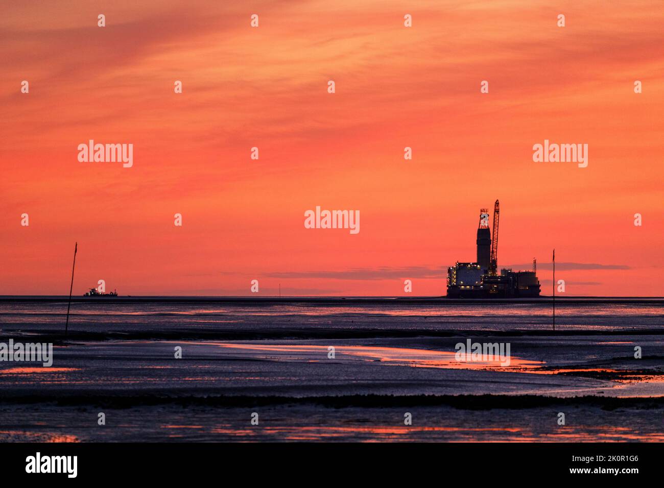 Germany's only oil rig "Mittelplate" at night Stock Photo Alamy