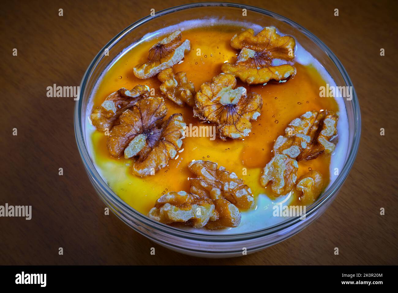Delicious homemade yogurt with organic honey and nuts Stock Photo