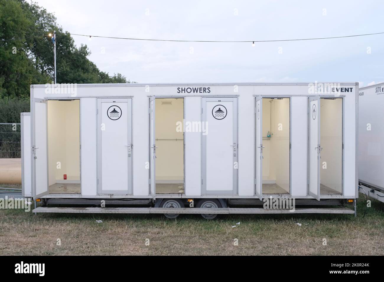 SHOWERS AT A FESTIVAL Stock Photo